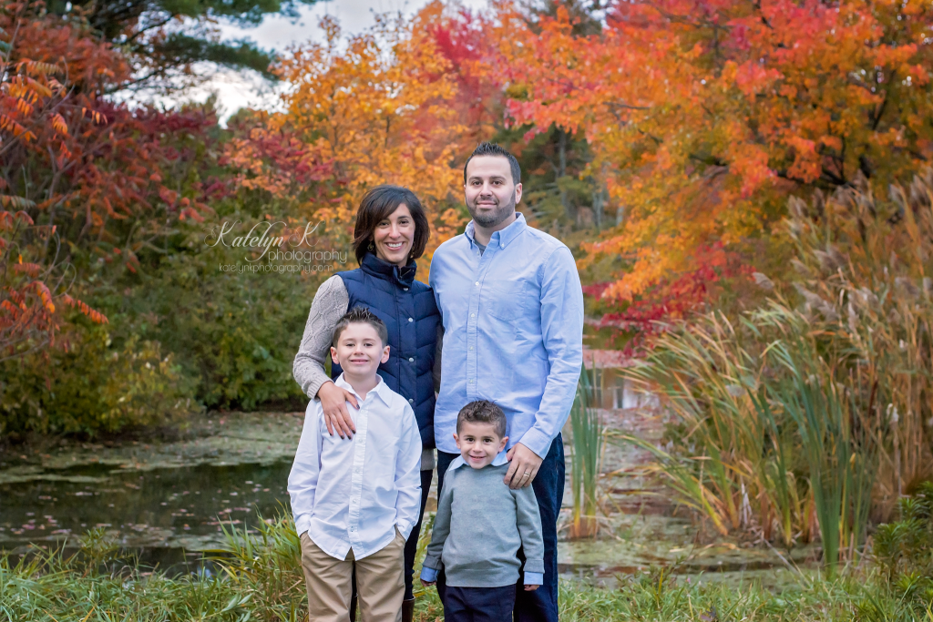 fall family photo at NH pond