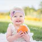 baby with pumpkin