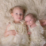 sisters in cream and pearls